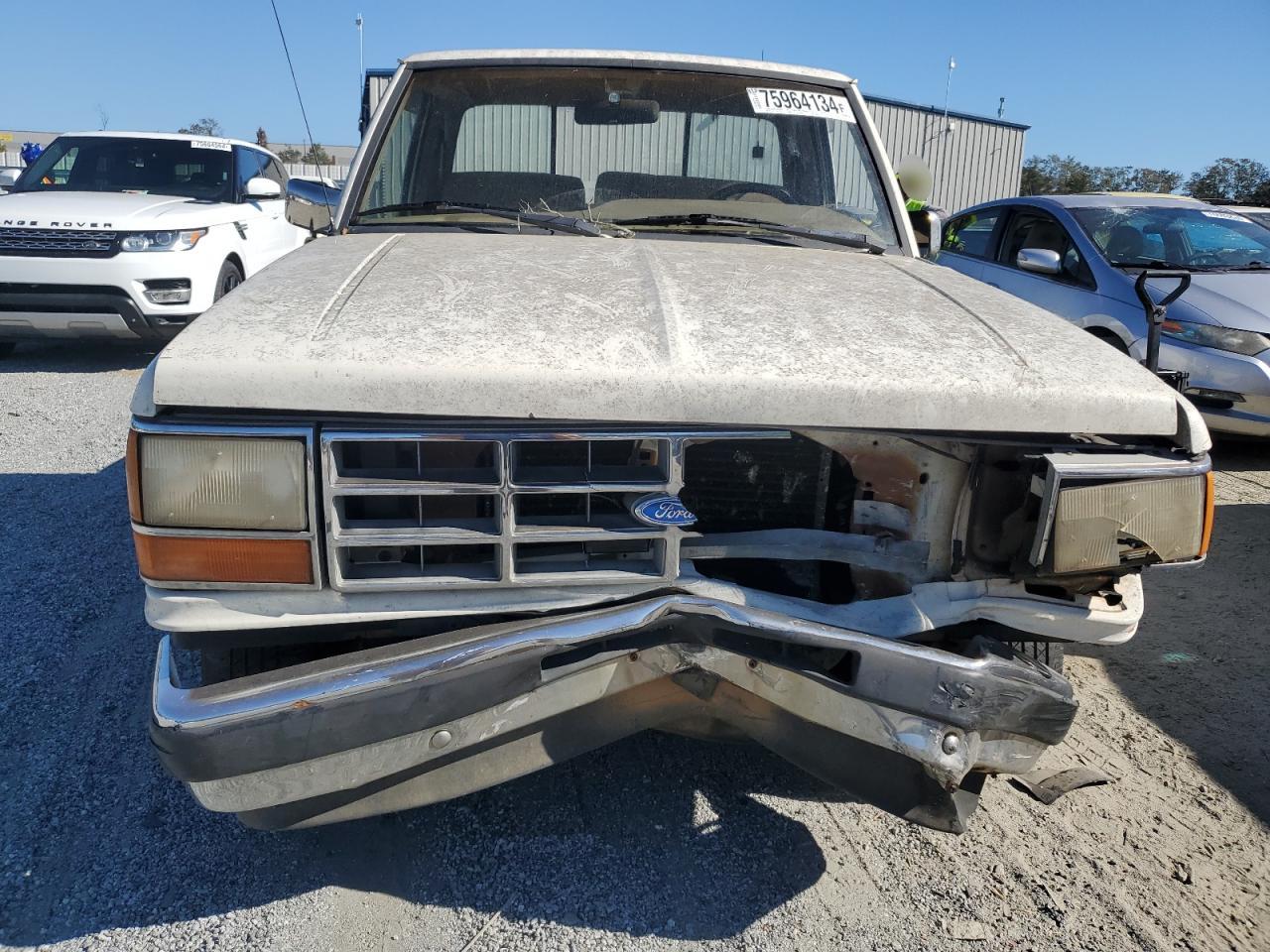 1990 Ford Ranger VIN 1FTCR10A8LUB55801 Copart auction photo, front end / mechanical damage thumbnail 5