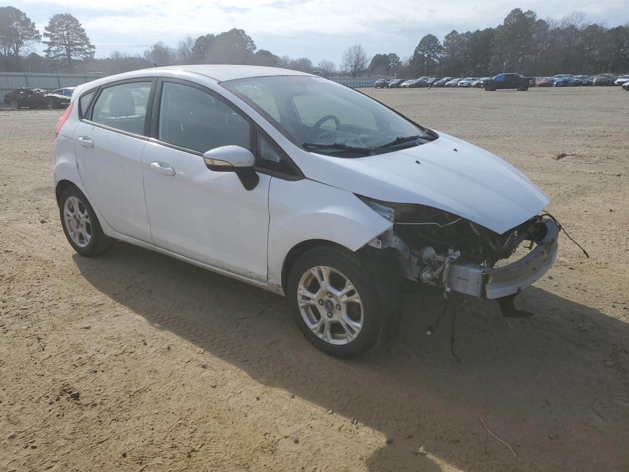 2016 Ford Fiesta VIN 3FADP4EJ1GM128945 Copart auction photo, front end / minor dent/scratches damage thumbnail 4
