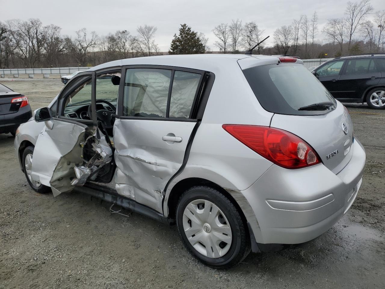 2011 Nissan Versa VIN 3N1BC1CP6BL438125 Copart auction photo, side damage thumbnail 2