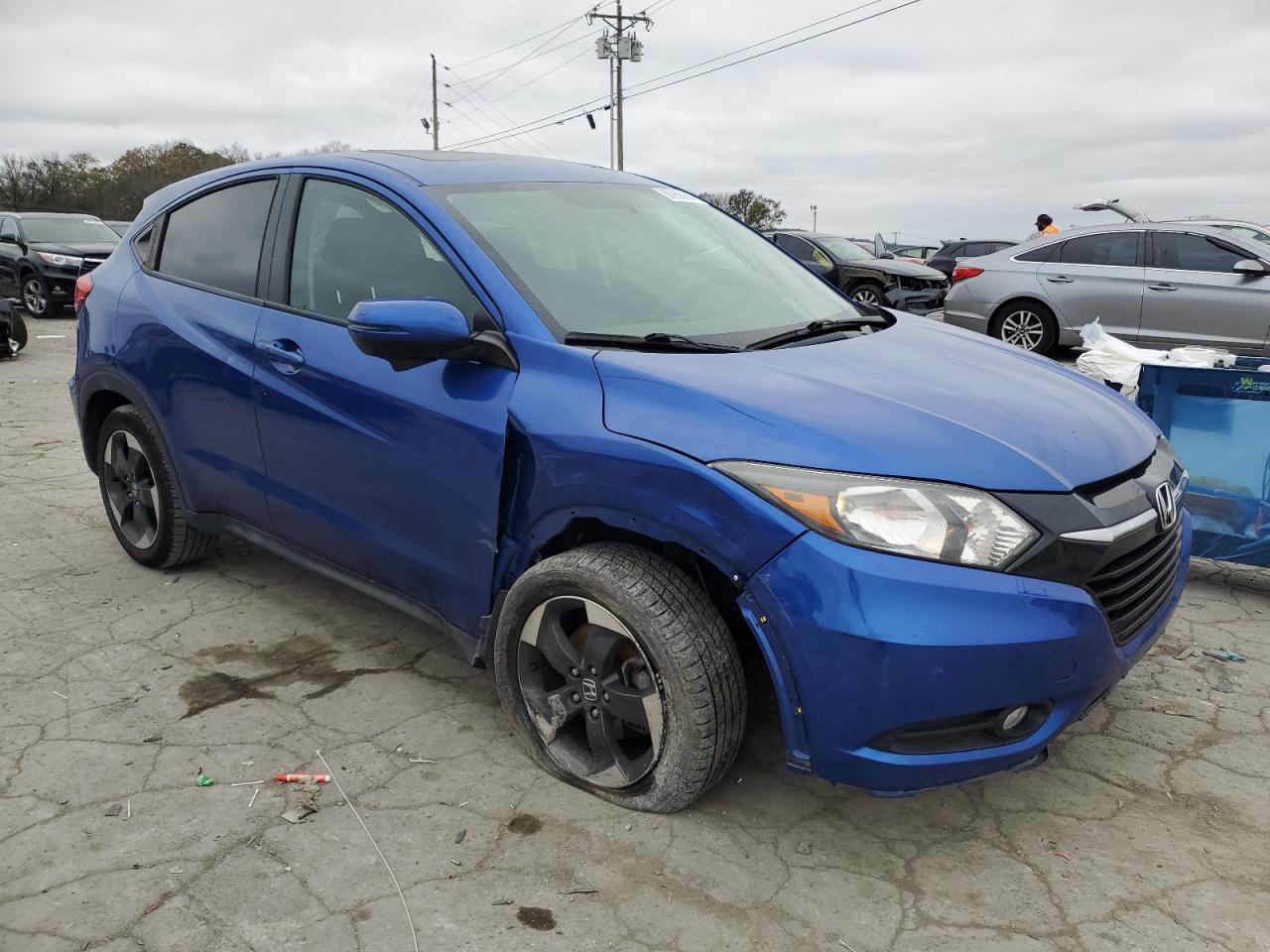 2018 Honda HR-V VIN 3CZRU5H50JM712039 Copart auction photo, side / front end damage thumbnail 4