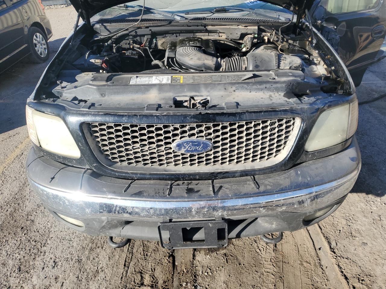 2002 Ford F-150 VIN 1FTRX18WX2NB60409 Copart auction photo, all over damage thumbnail 12