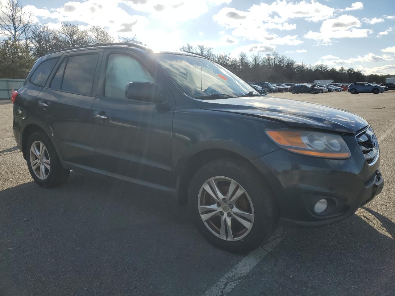 2011 Hyundai Santa Fe VIN 5XYZK3AB6BG047131 Copart auction photo, front end / side damage thumbnail 4