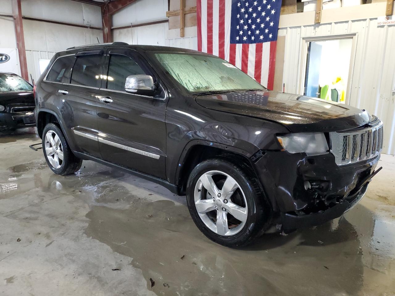 2013 Jeep Grand Cherokee VIN 1C4RJECT1DC574571 Copart auction photo, front end / minor dent/scratches damage thumbnail 4