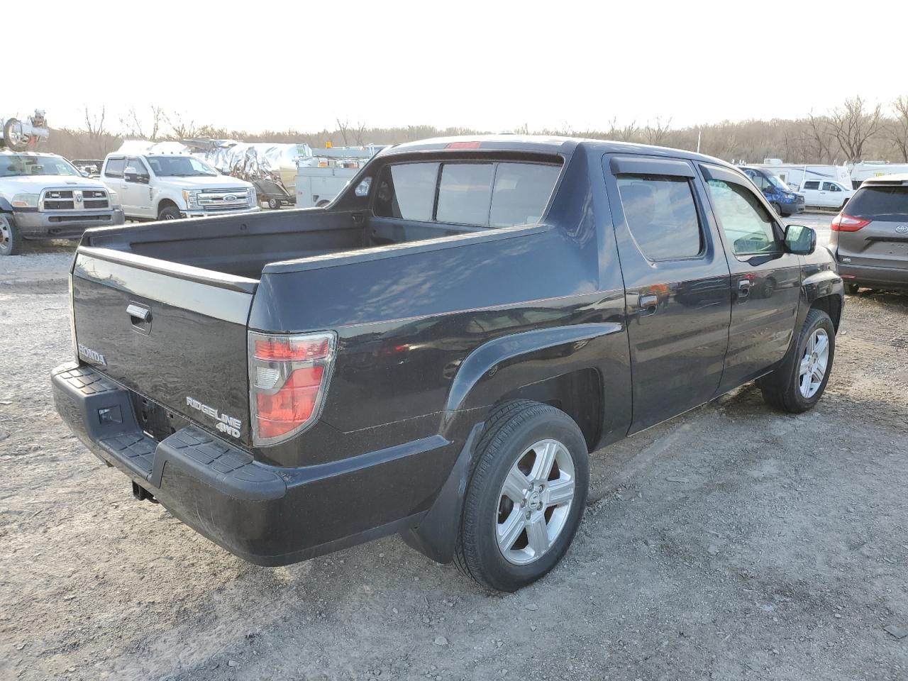 2012 Honda Ridgeline VIN 5FPYK1F58CB454158 Copart auction photo, minor dent/scratches damage thumbnail 3