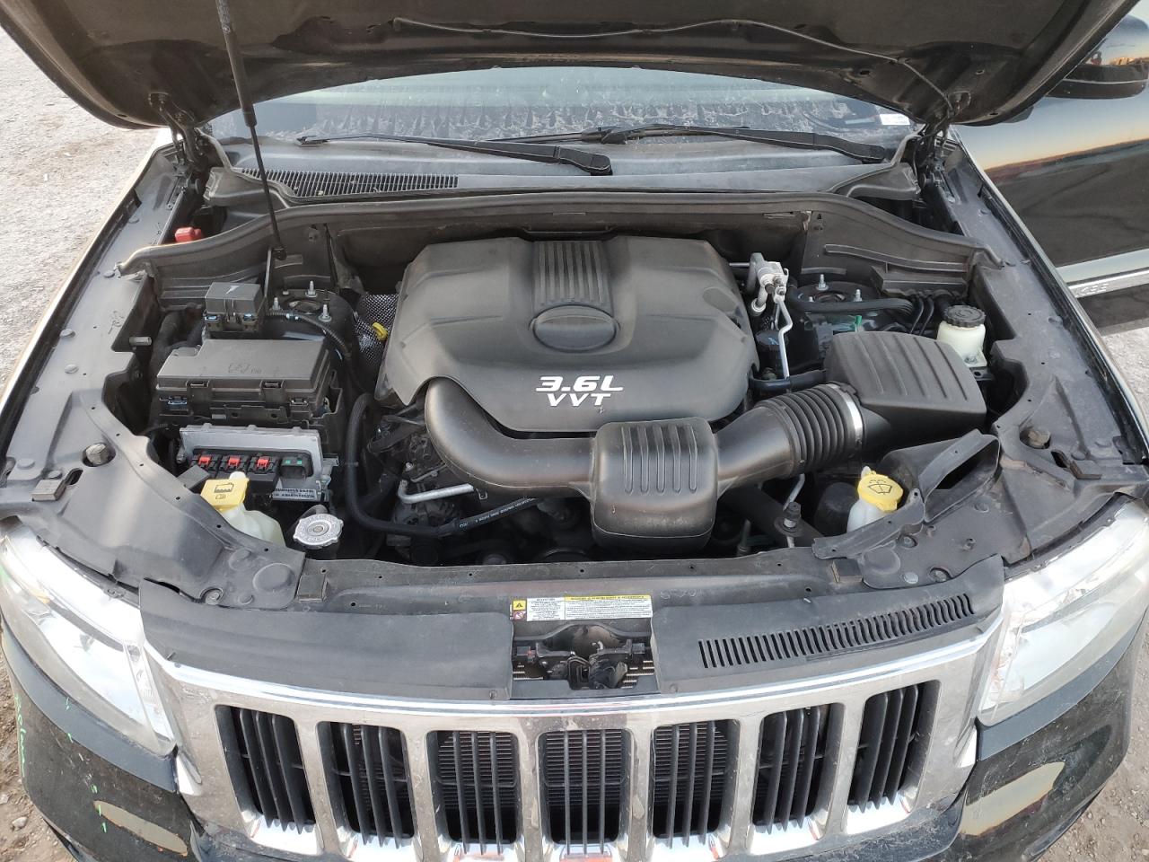 2012 Jeep Grand Cherokee VIN 1C4RJFAGXCC287854 Copart auction photo, front end / minor dent/scratches damage thumbnail 12