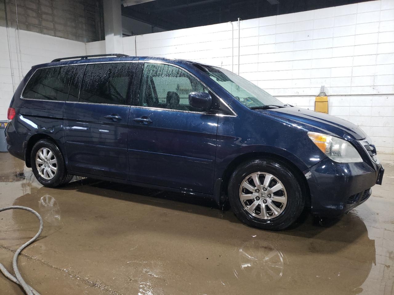 2009 Honda Odyssey VIN 5FNRL38719B020810 Copart auction photo, front end / side damage thumbnail 4