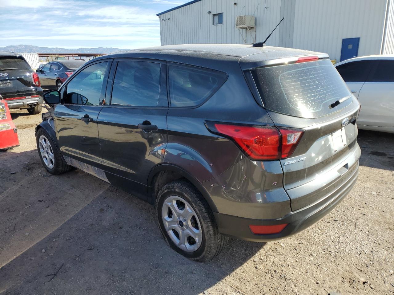 2019 Ford Escape VIN 1FMCU0F73KUB86632 Copart auction photo, side / front end damage thumbnail 2