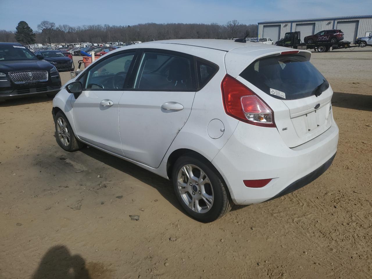 2016 Ford Fiesta VIN 3FADP4EJ1GM128945 Copart auction photo, front end / minor dent/scratches damage thumbnail 2