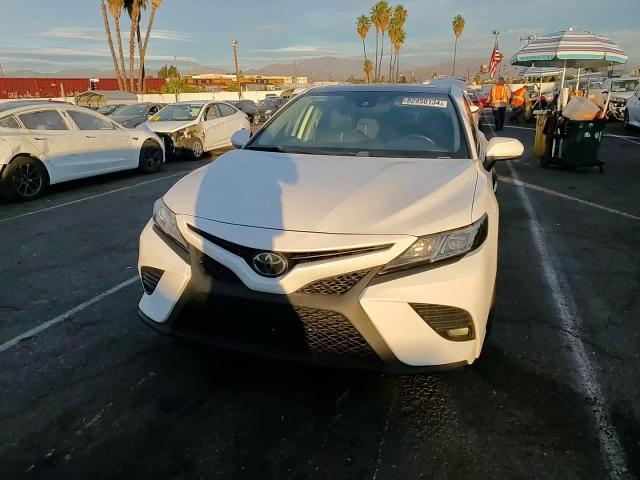 2020 Toyota Camry VIN 4T1G11AK8LU974609 Copart auction photo, rear end / minor dent/scratches damage thumbnail 10