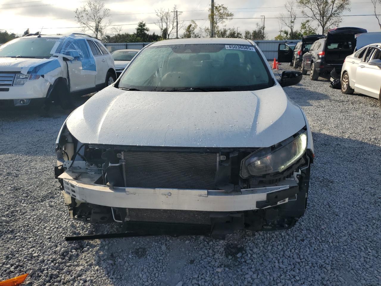 2020 Honda Civic VIN 19XFC2F61LE010069 Copart auction photo, all over / front end damage thumbnail 5