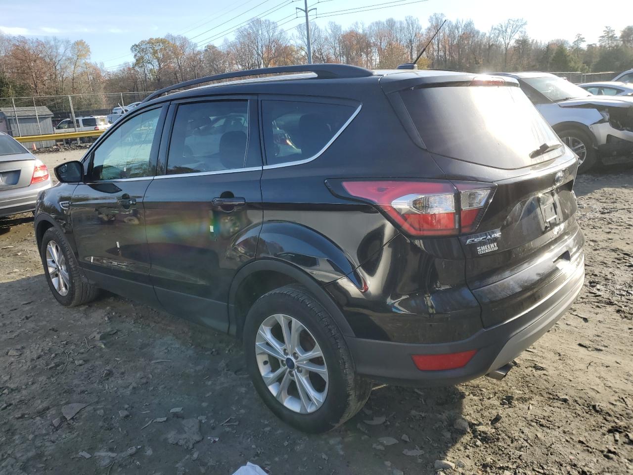 2018 Ford Escape VIN 1FMCU9GD2JUA07374 Copart auction photo, vandalism / all over damage thumbnail 2