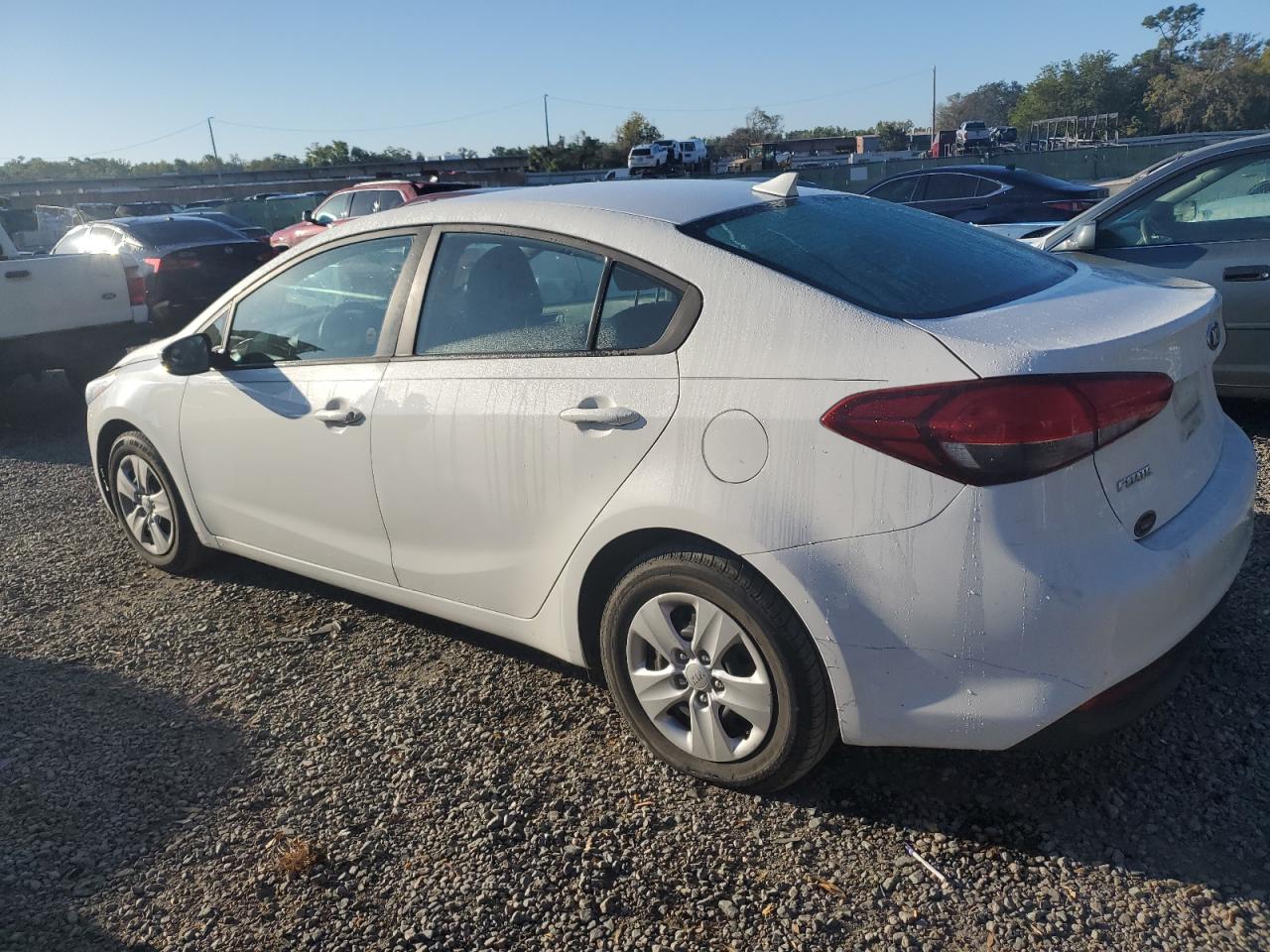 2017 KIA Forte VIN 3KPFK4A75HE034929 Copart auction photo, side / front end damage thumbnail 2