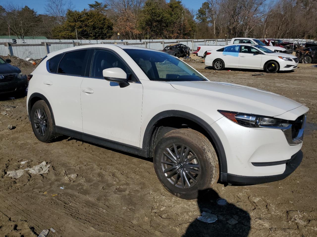 2021 Mazda CX-5 VIN JM3KFBCM3M0389750 Copart auction photo, rear end damage thumbnail 4