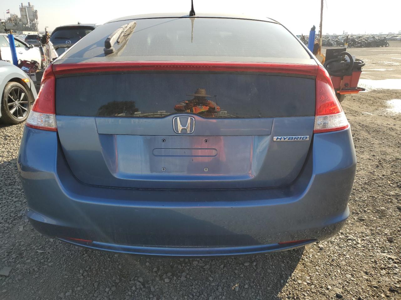 2010 Honda Insight VIN JHMZE2H77AS024404 Copart auction photo, minor dent/scratches damage thumbnail 6