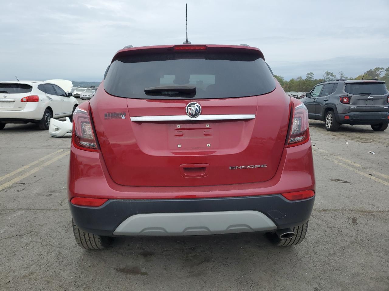 2019 Buick Encore VIN KL4CJASB6KB879777 Copart auction photo, side / front end damage thumbnail 6
