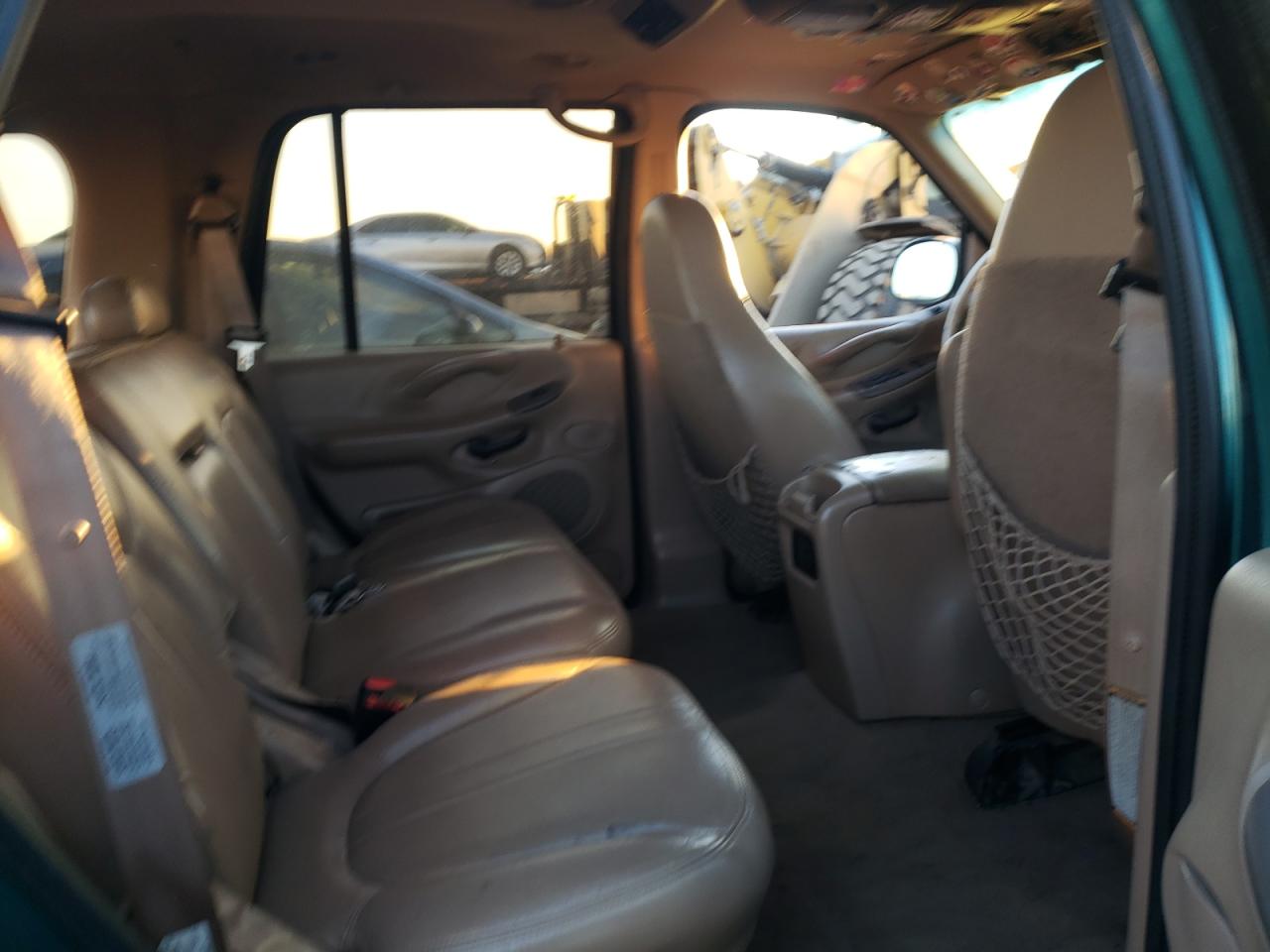 1997 Ford Expedition VIN 1FMFU18L3VLA38388 Copart auction photo, burn - engine damage thumbnail 11