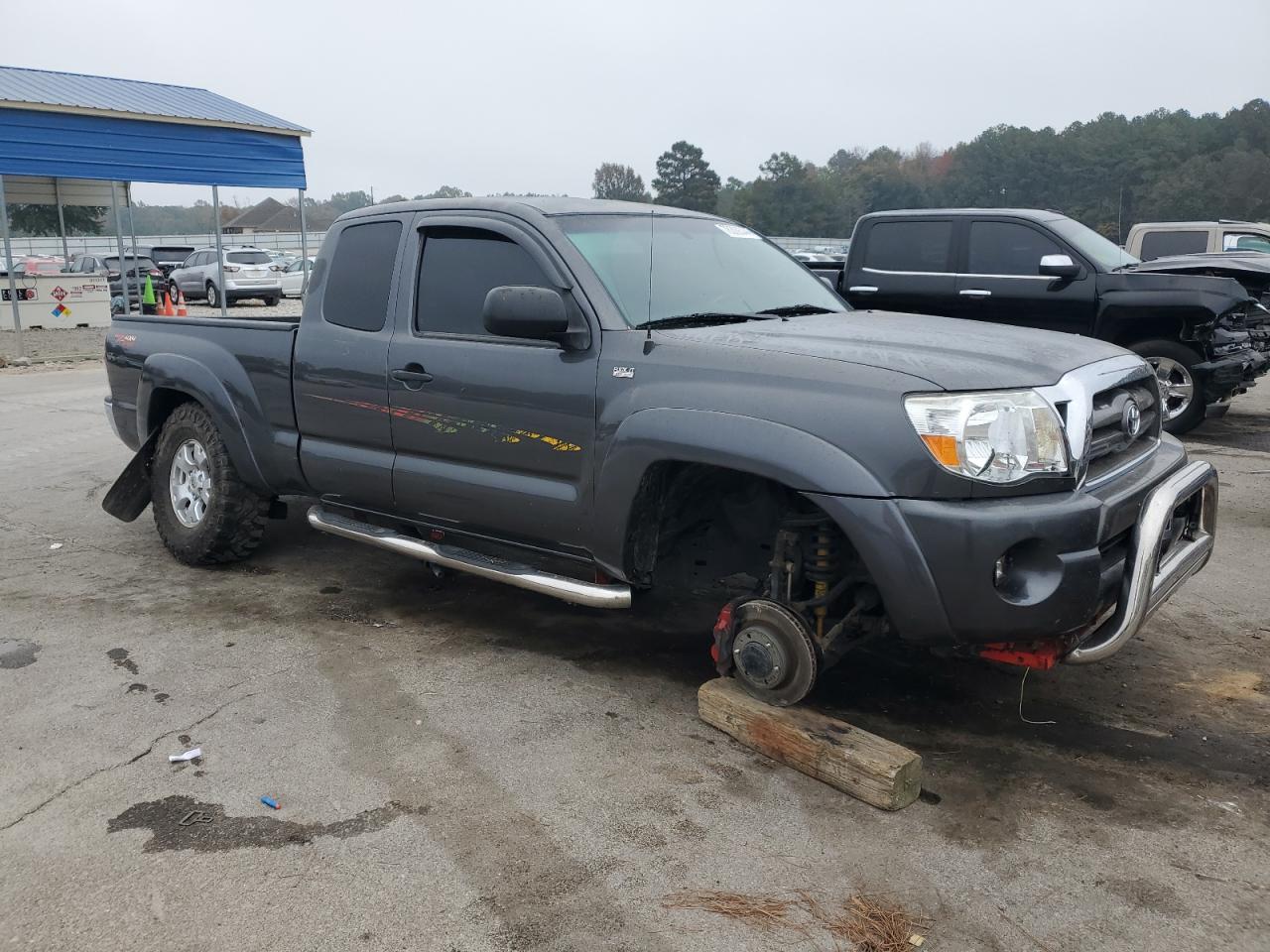 2010 Toyota Tacoma VIN 5TEUU4ENXAZ697857 Copart auction photo, side damage thumbnail 4