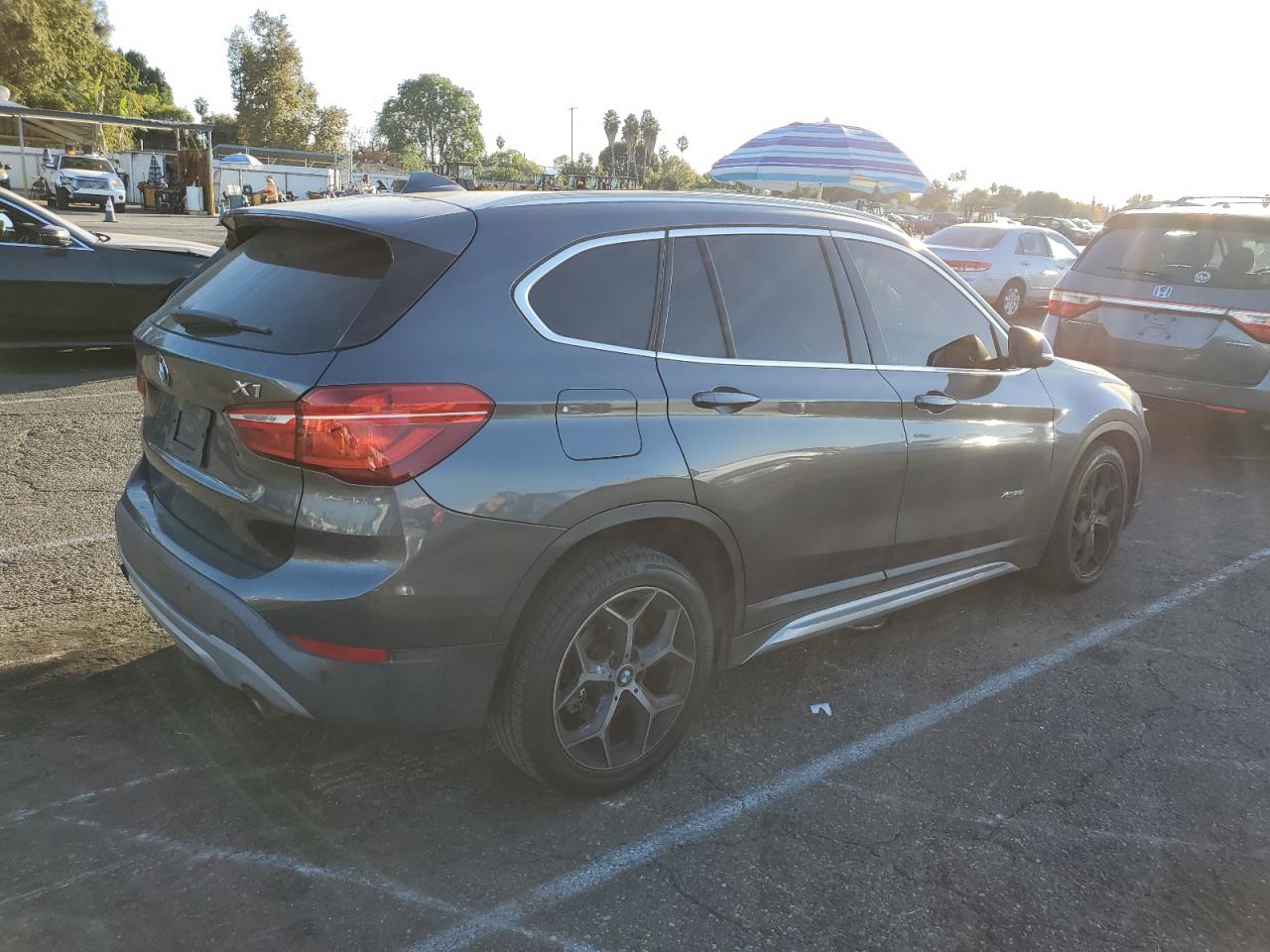 2016 BMW X1 VIN WBXHT3C34GP889889 Copart auction photo, front end / undercarriage damage thumbnail 3