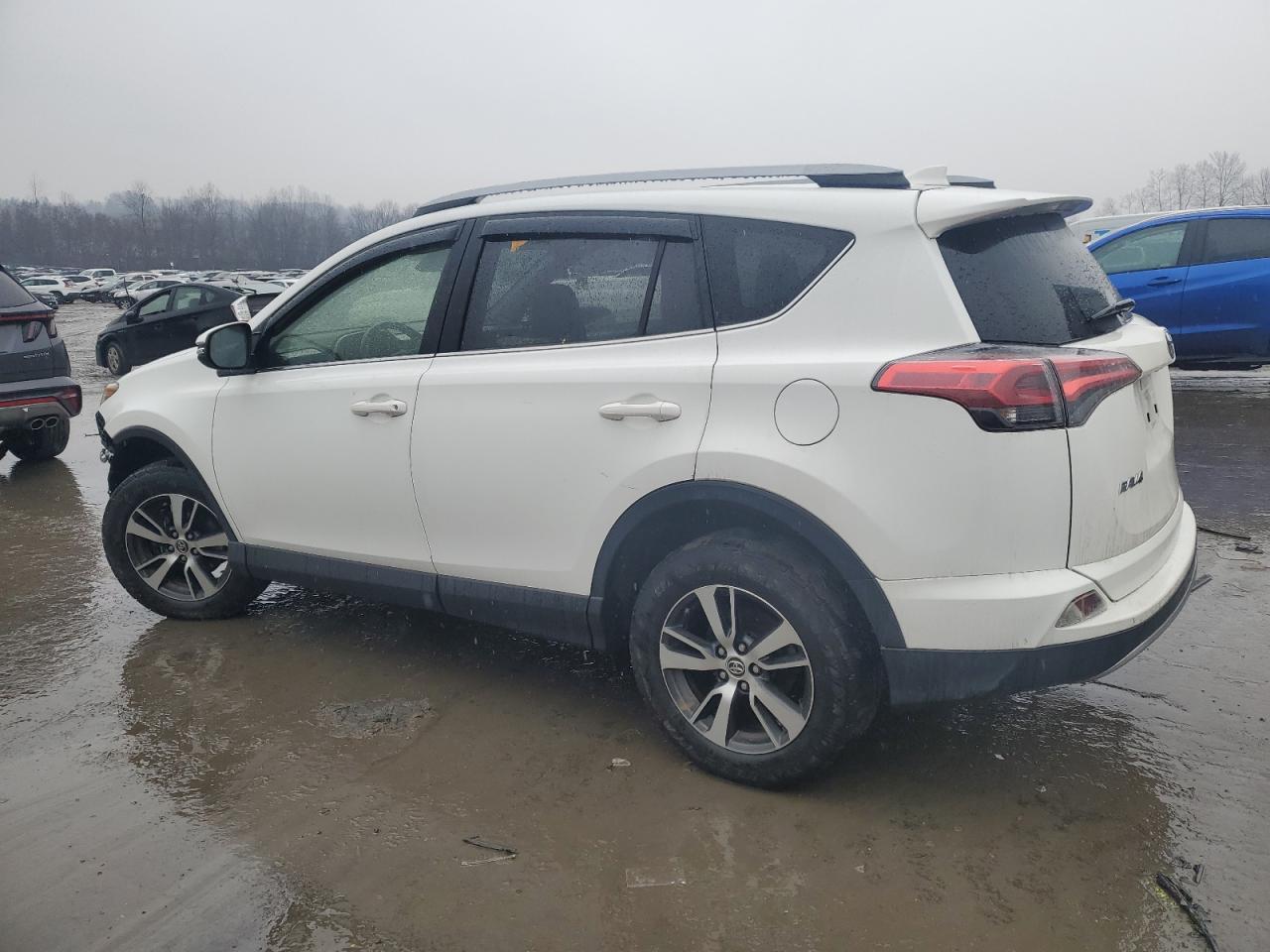2018 Toyota RAV 4 VIN JTMRFREV6JJ192096 Copart auction photo, front end / side damage thumbnail 2