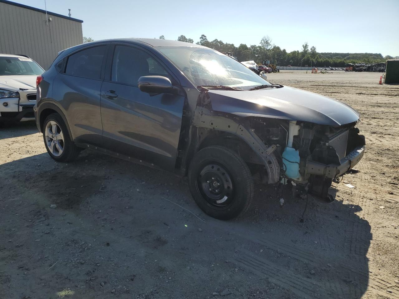 2016 Honda HR-V VIN 3CZRU5H50GM741016 Copart auction photo, front end / side damage thumbnail 4