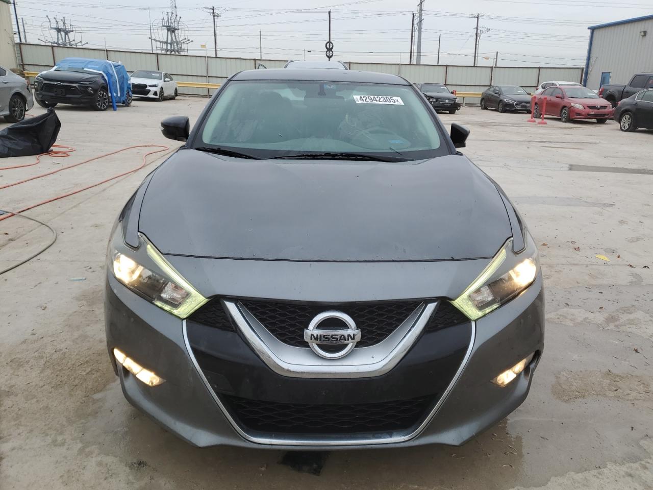 2017 Nissan Maxima VIN 1N4AA6AP4HC401292 Copart auction photo, rear end / minor dent/scratches damage thumbnail 5
