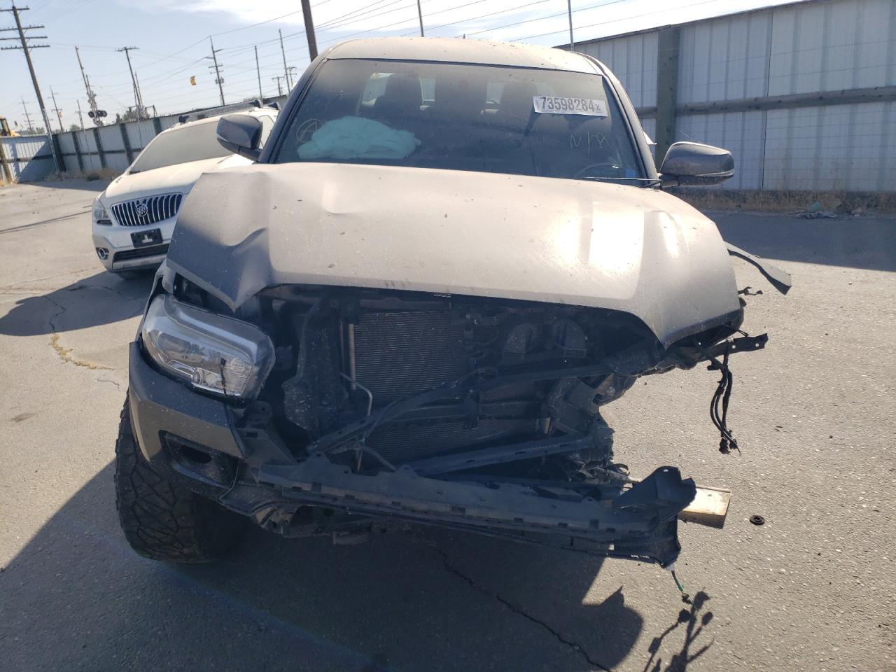 2017 Toyota Tacoma VIN 3TMDZ5BN2HM023642 Copart auction photo, front end / undercarriage damage thumbnail 5