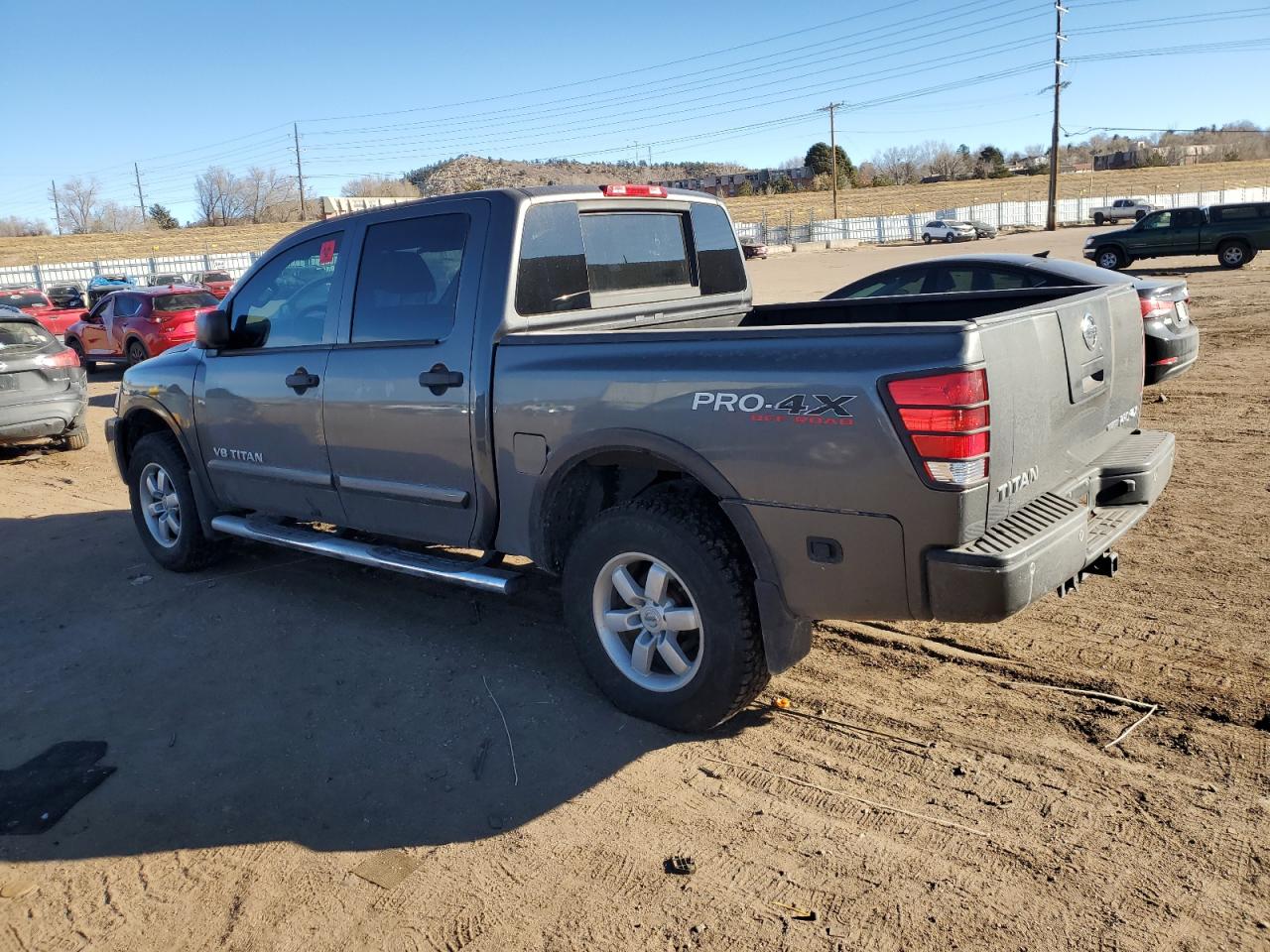 2012 Nissan Titan VIN 1N6BA0EC2CN317761 Copart auction photo, side / front end damage thumbnail 2
