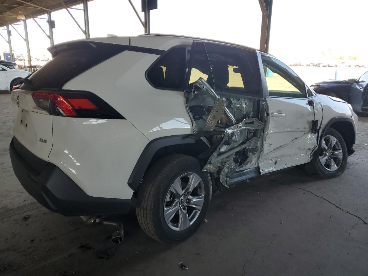 2023 Toyota RAV 4 VIN 2T3W1RFVXPW239284 Copart auction photo, side / front end damage thumbnail 3