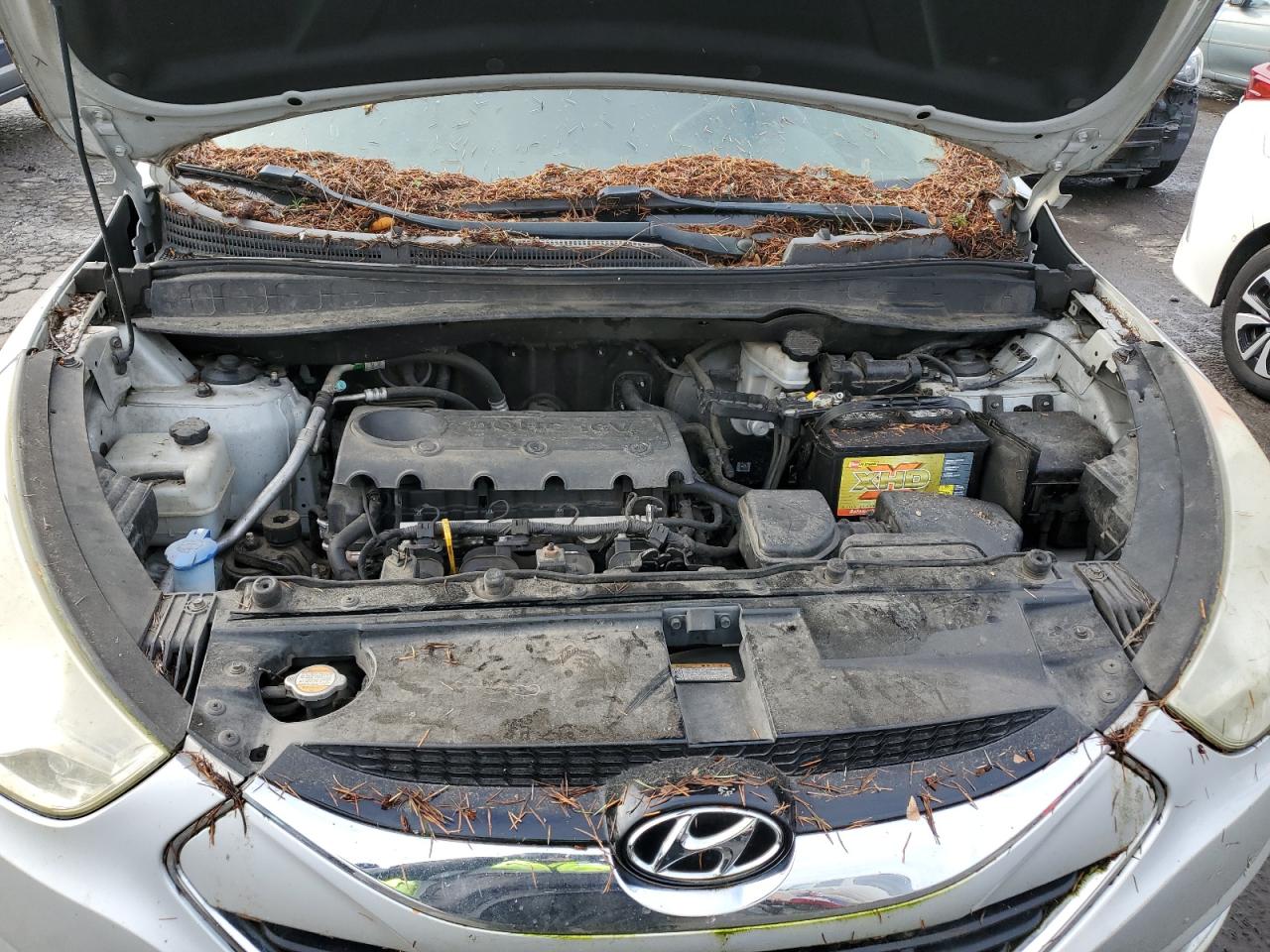 2012 Hyundai Tucson VIN KM8JUCAC5CU525695 Copart auction photo, water/flood / mechanical damage thumbnail 11