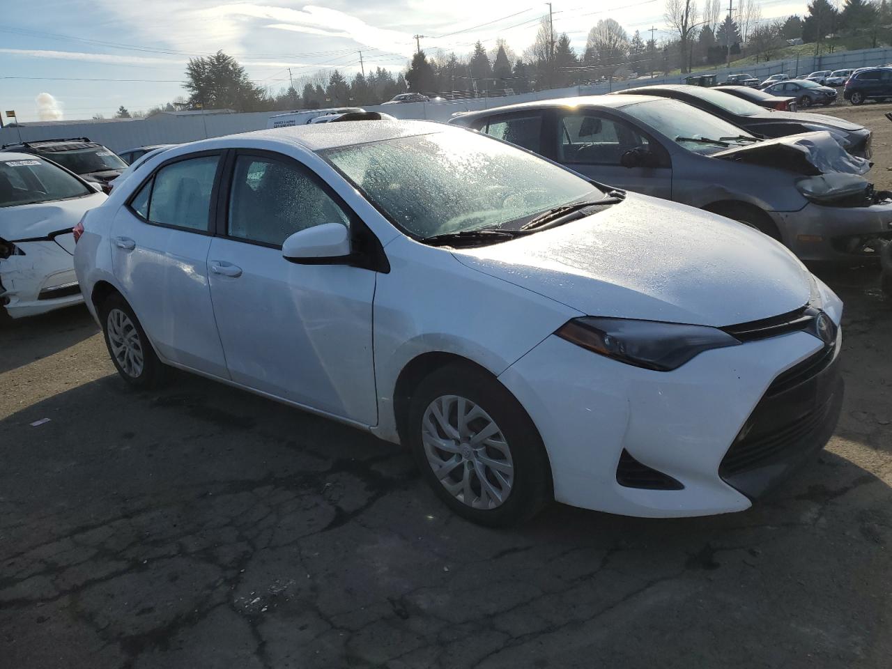 2018 Toyota Corolla VIN 5YFBURHE7JP847820 Copart auction photo, side damage thumbnail 4