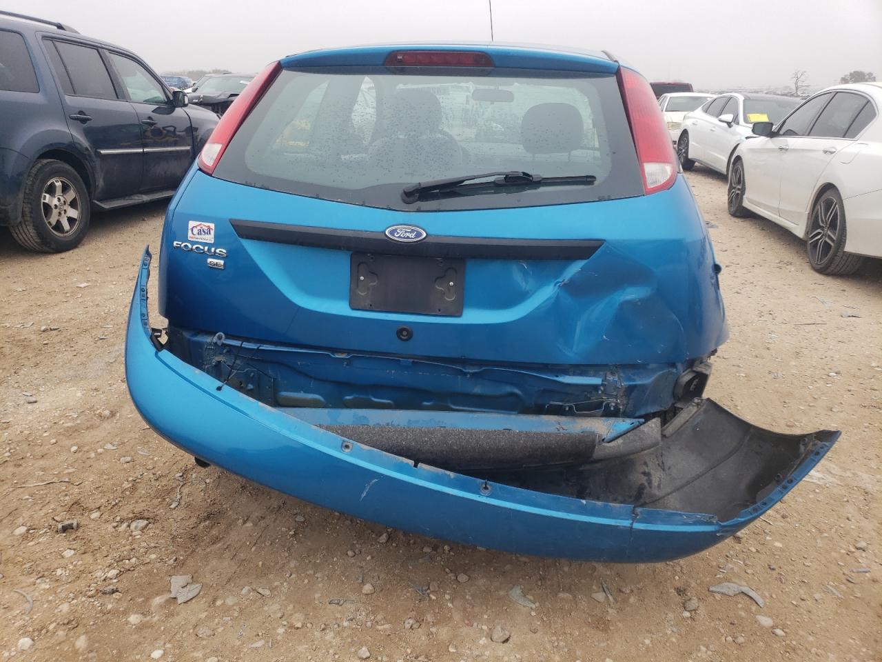 2007 Ford Focus VIN 1FAFP31N77W298965 Copart auction photo, rear end / minor dent/scratches damage thumbnail 6