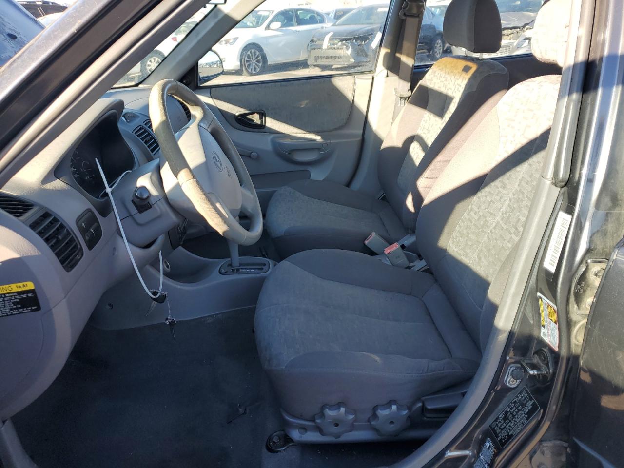 2005 Hyundai Accent VIN KMHCG45C95U665574 Copart auction photo, rear end / side damage thumbnail 7