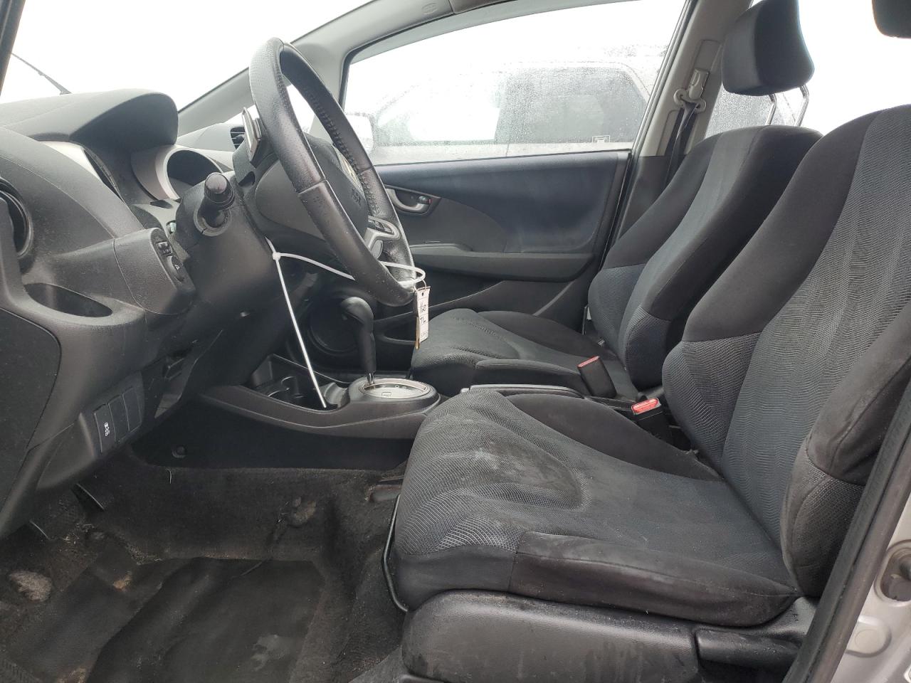2009 Honda Fit VIN JHMGE88649S009257 Copart auction photo, side / rear end damage thumbnail 7