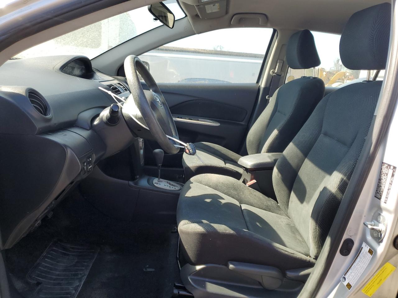 2010 Toyota Yaris VIN JTDBT4K38A4075294 Copart auction photo, front end / side damage thumbnail 7