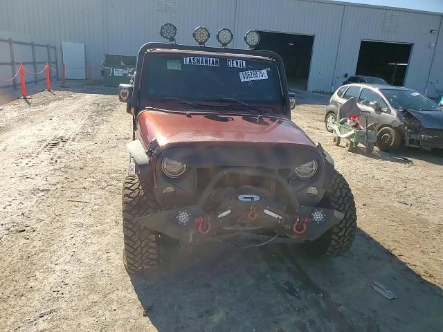 2009 Jeep Wrangler VIN 1J4GB39129L705331 Copart auction photo, front end / minor dent/scratches damage thumbnail 11
