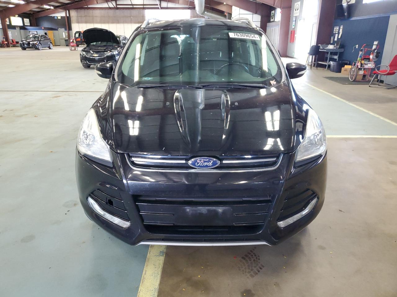 2016 Ford Escape VIN 1FMCU9JX6GUA89458 Copart auction photo, side / minor dent/scratches damage thumbnail 5