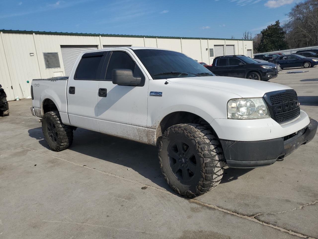 2005 Ford F-150 VIN 1FTPW14535FA13600 Copart auction photo, front end damage thumbnail 4