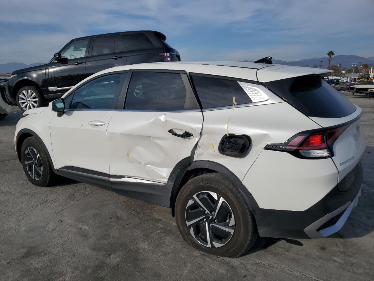2023 KIA Sportage VIN KNDPUCAG6P7116157 Copart auction photo, side / rear end damage thumbnail 2
