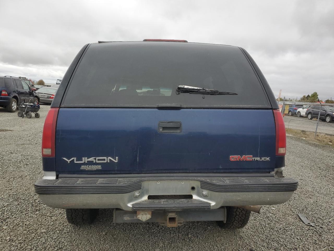 1996 GMC Yukon VIN 1GKEK13R3TJ747966 Copart auction photo, all over damage thumbnail 6