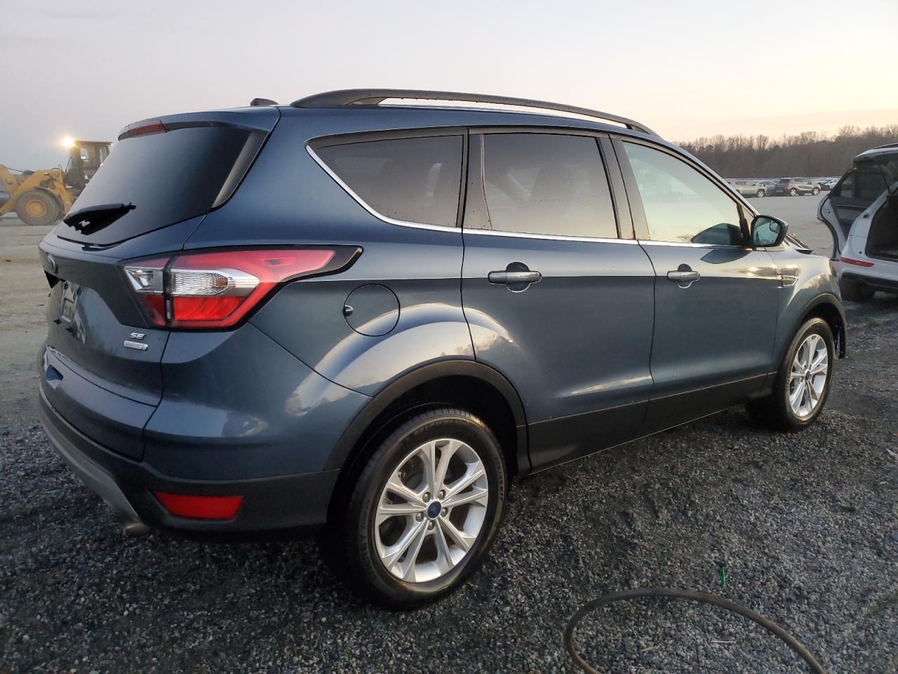 2018 Ford Escape VIN 1FMCU0GD3JUA60712 Copart auction photo, front end damage thumbnail 3