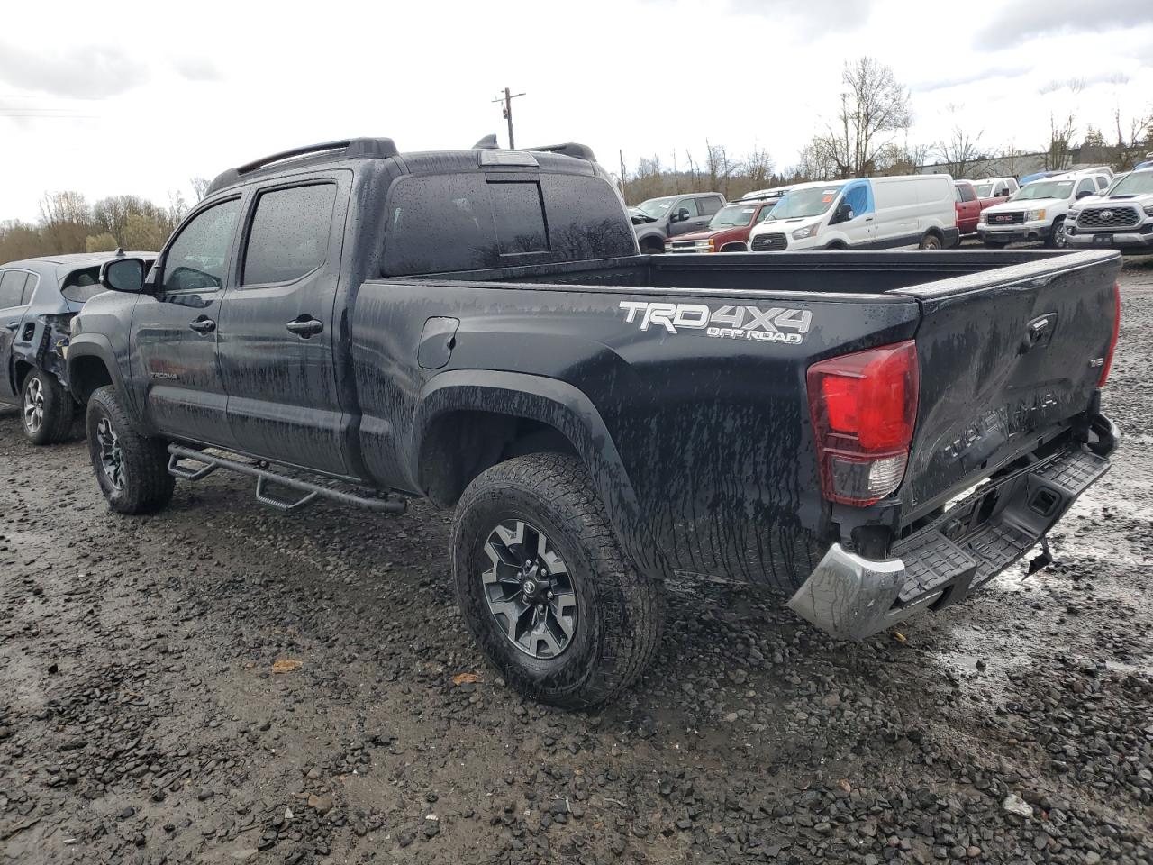 2018 Toyota Tacoma VIN 3TMDZ5BN6JM049585 Copart auction photo, rear end damage thumbnail 2