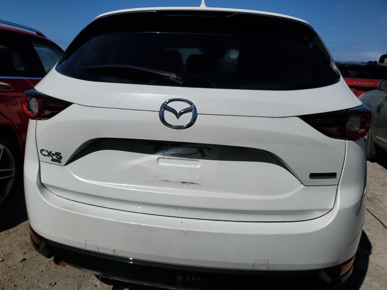 2021 Mazda CX-5 VIN JM3KFBCMXM0430536 Copart auction photo, water/flood damage thumbnail 6