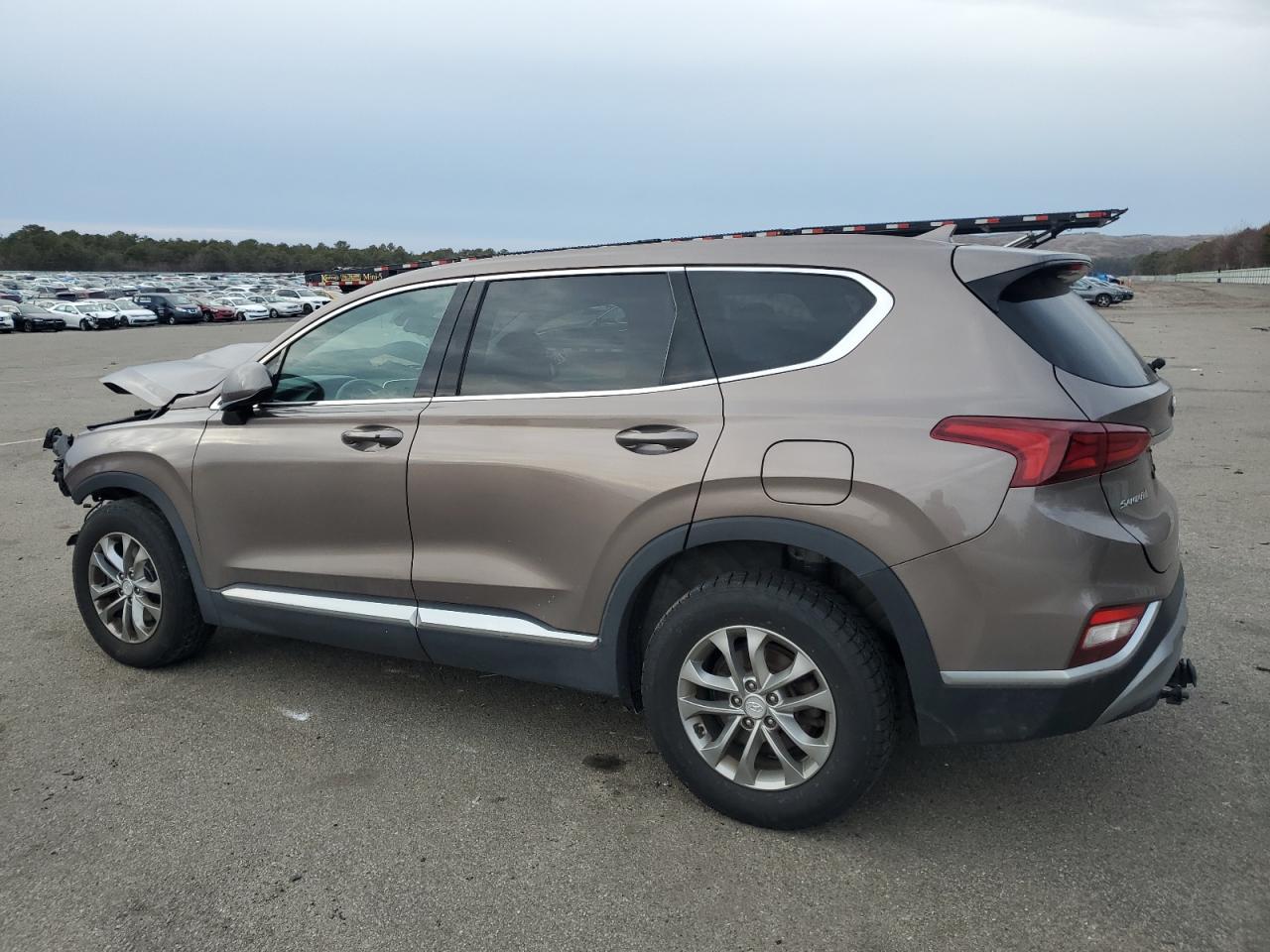 2019 Hyundai Santa Fe VIN 5NMS3CAD5KH123959 Copart auction photo, front end / minor dent/scratches damage thumbnail 2