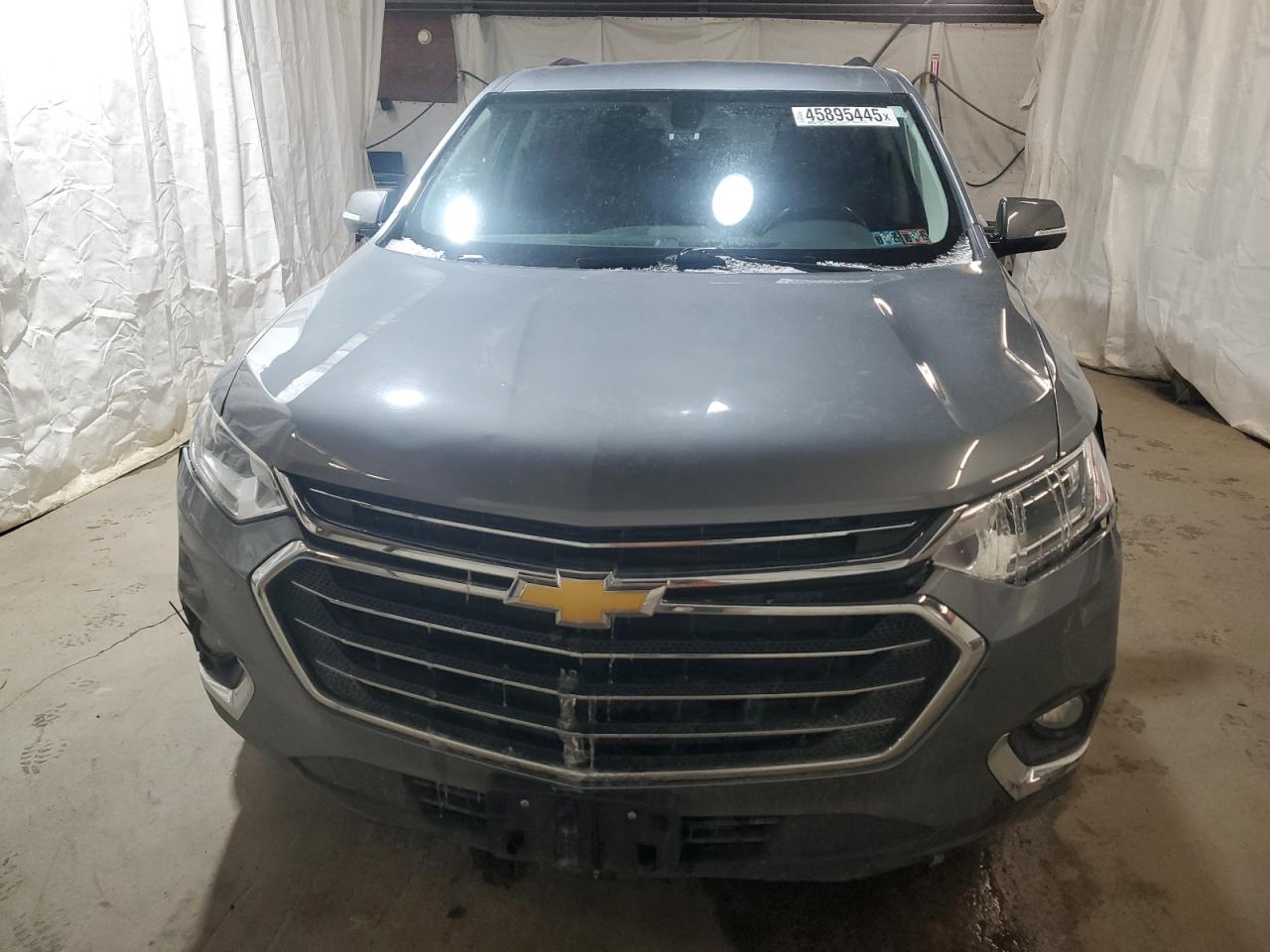 2019 Chevrolet Traverse VIN 1GNEVGKW7KJ318722 Copart auction photo, front end / side damage thumbnail 5