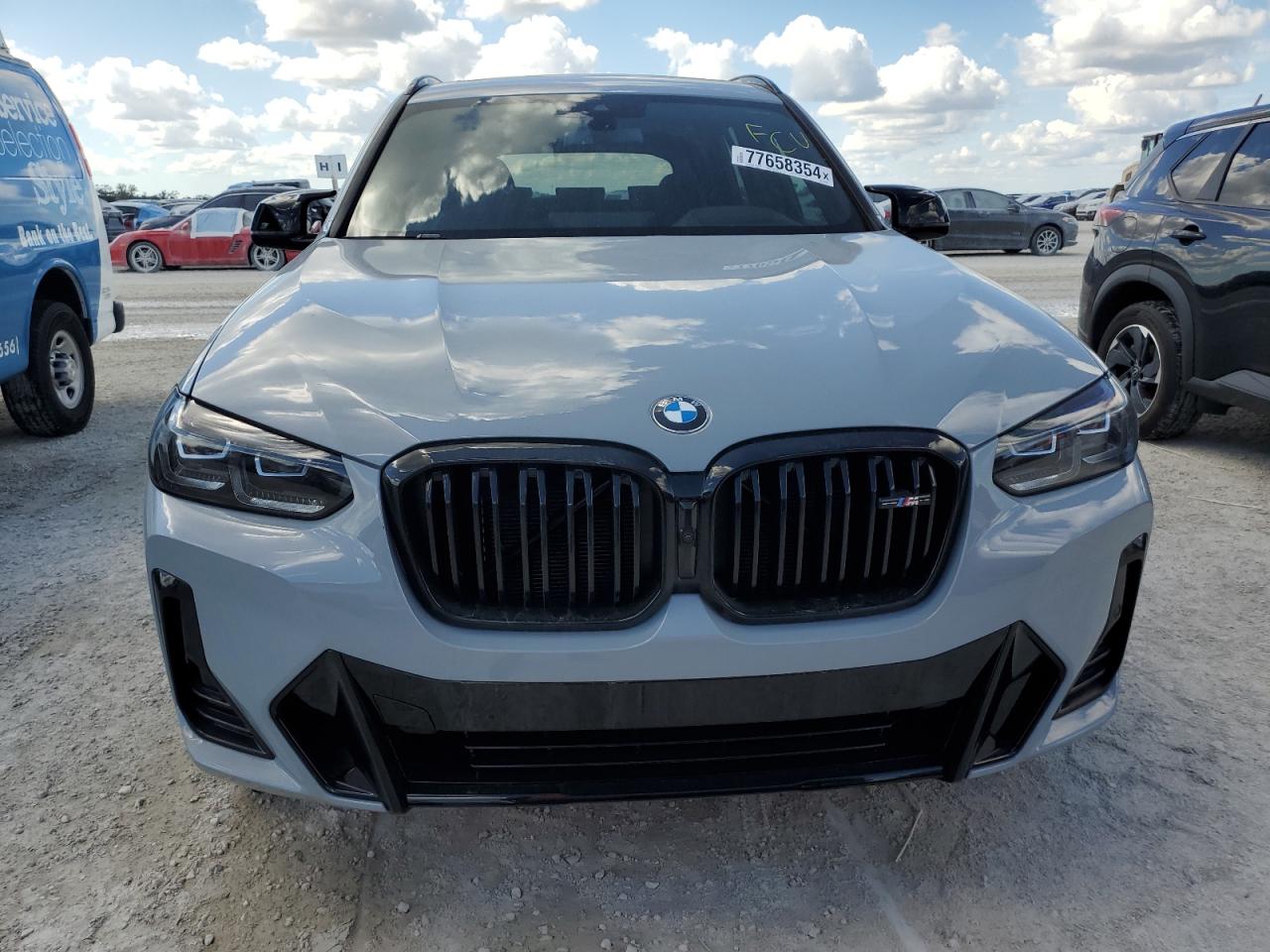 2024 BMW X3 M VIN 5UX83DP09R9W77482 Copart auction photo, water/flood damage thumbnail 5