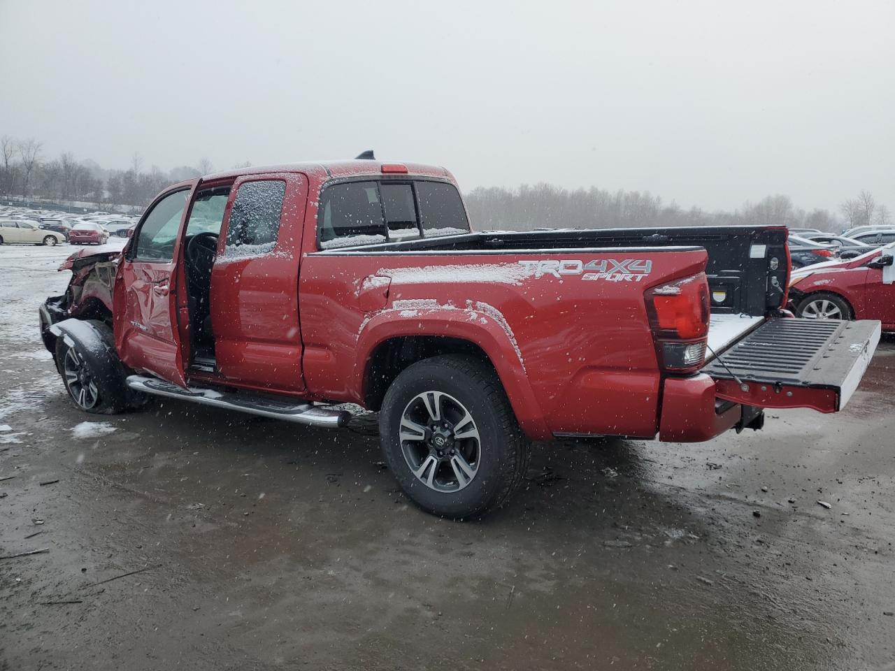2018 Toyota Tacoma VIN 5TFSZ5AN1JX141450 Copart auction photo, side / front end damage thumbnail 2