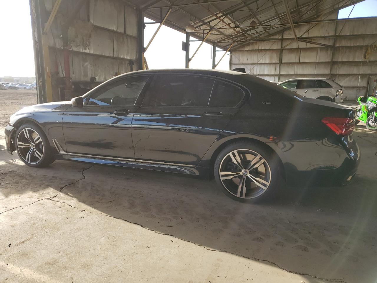 2018 BMW 7er VIN WBA7H6C57JG614681 Copart auction photo, front end damage thumbnail 2