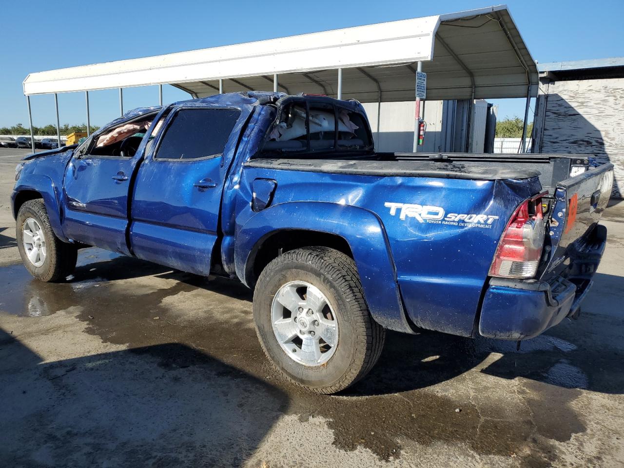 2014 Toyota Tacoma VIN 3TMLU4EN0EM159456 Copart auction photo, rollover damage thumbnail 2
