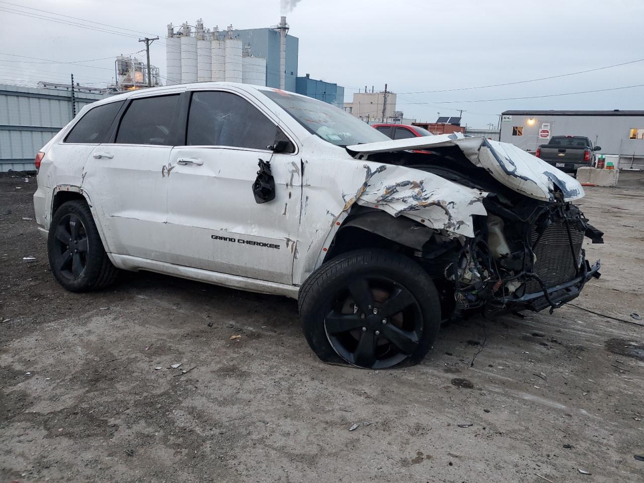 2015 Jeep Grand Cherokee VIN 1C4RJFAG3FC711217 Copart auction photo, all over damage thumbnail 4