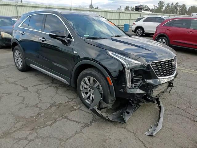 2021 Cadillac XT4 VIN 1GYFZDR4XMF016846 Copart auction photo, side / front end damage thumbnail 11